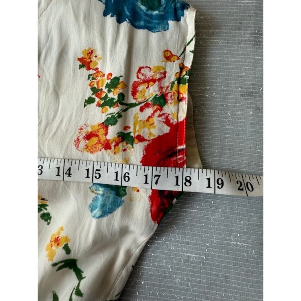 COTTON CANDY CREAM AND FLORAL ROMPER SIZE SMALL - Picture 6 of 7
